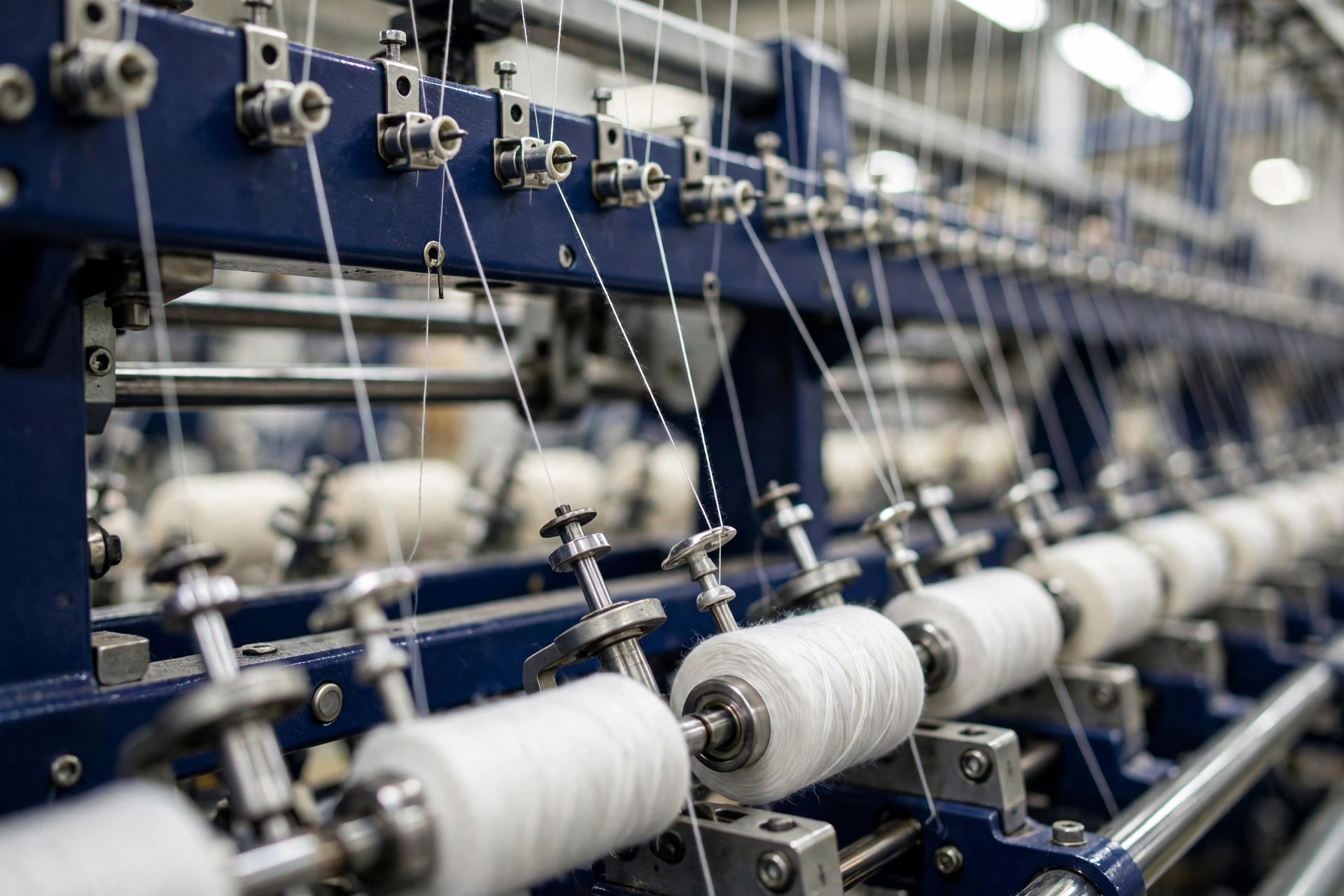 Sample image: ring-spinning frames winding white polyester yarn